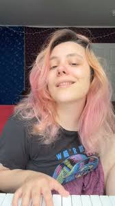 Ballerinas Kennedy George, 14, and Ava Holloway, 14, pose in front of the  monument of Confederate General Robert E. Lee in Richmond after Virginia  Governor Ralph Northam ordered its removal. . This