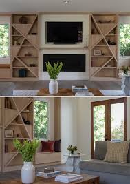 Custom modern bookcase designs around fireplace. Creative Shelving Shapes Were Designed For This Living Room Wall That Also Includes A Tv Fireplace And A Pair Of Window Seats