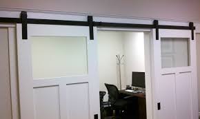 Eye Catching Half Frosted Glass Interior Barn Doors In White Finished Hanging Iron Hardware Moulding Sliding Doors Interior Glass Barn Doors Barn Doors Sliding