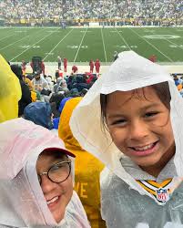 Solo Cards fan in my family. Still represented. ✊🏽Despite the rain, cold  and the Packers coming away with the win, it was one for the books  @lambeau.nation. #KroupaKrew #azcardinals #lambeaufield #week6nfl🏈 🧀