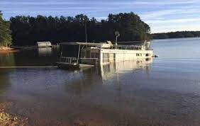 So, when you're diving around this, you're diving into the middle. Sinking Houseboats Removal From Lake Lanier Has Become Struggle Forsyth News