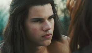 But in real life, he wears his dark brown hair styled with waves and spikes. Jacob And Bella Image The Twilight Saga Breaking Dawn Part 1 Hd Trailer Taylor Lautner Long Hair Jacob Black Twilight Twilight Saga