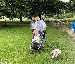 The couple's sons became the prime minister's sixth child and his third son. Boris Johnson And Baby Son Wilf Are Dragged On A Very Hair Raising Run Through Field Near Chequers Newsbinding