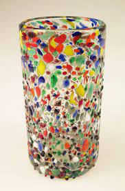 The raised confetti pebble pattern is distinctive and provides a colorful accent to your home bar or can be used for everyday drink ware. Confettiglassware Confetti Rim Made In Mexico With Recycled Glass Confetti Swirl Solid Confetti Bright Confetti