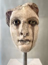 Detail of a hollow-cast bronze statuette of a seated cat dated to the Late  Period (circa 712-332 BCE). Cats were associated with Bastet, a goddess of  protection, pleasure, fertility, music, dance, and