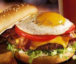 A Fried Egg And Crispy Bacon Top The Royal Red Robin Burger Gourmet Burgers Red Robin Gourmet Burgers Travel Food