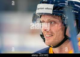 Carl Klingberg # 48 (EV Zug) against # 76 Philip Varone (Bern) during the  National League Regular Season ice hockey game between EV Zug and SC Bern 