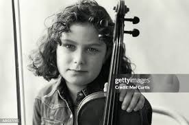 Girl Holding A reputable Violin