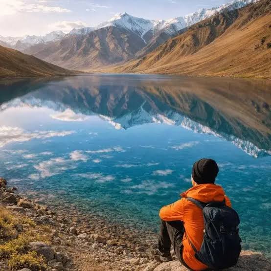 Chandratal Lake, the Moon Lake of Spiti Valley, with its crescent shape reflecting the surrounding Himalayan peaks