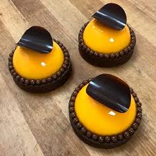 Mandarin Mousse Caraibe Dark Chocolate Cremeux And Ganache Chefstalk Cheflife Chef Pastry Cake Pastrychef Fancy Desserts Gourmet Desserts Mini Desserts