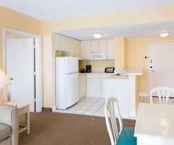 Spacious two bedroom/two bath suites and deluxe studio suites with fully equipped kitchenettes and private balconies. Orlando Hotel Suites Two Bedroom Suite The Enclave Hotel Suites