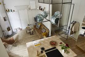 small apartment with gold kitchen