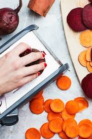 Chop vegetables and easily transfer them a pan or bowl; Review Oxo Good Grips Chef S Mandoline Slicer 2 0 Epicurious
