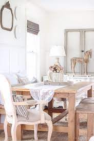 A silver vintage style dining table sits at the center of the space. French Country In The Dining Room Love Grows Wild