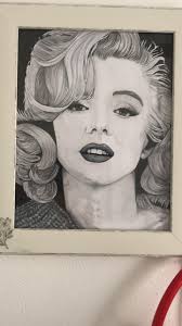 A portrait of Marilyn Monroe painted by Italian pin-up artist Silvano  'Nano' Campeggi.