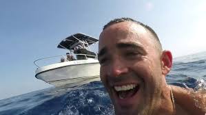 Whale and dolphins 5 miles off Elliot Key!