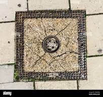 Telecommunications manhole cover hi-res stock photography ...