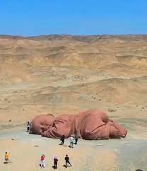 Update: The Child of the Earth sculpture + video ...............It  crouched on the ground and fell asleep on the Gobi Desert