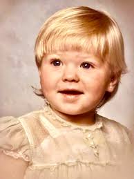 Little girl in a green dress