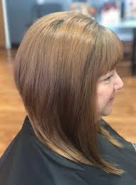 Choose a cut with bangs and short feathered sideburns; 60 Most Popular Short Hairstyles For Women Over 50