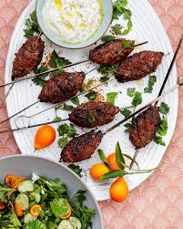 Lamb Kebabs With Herbed Yogurt Ground Lamb Is Spiced With Cumin Sumac Coriander And Aleppo Pepper For These Fla Lamb Kebabs Lamb Recipes Appetizer Recipes