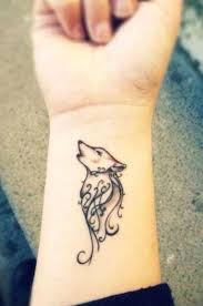 35 Inspiring Cool Wrist Tattoos For Men Women To Get Now Chic Tattoo Small Tribal Tattoos Tribal Wolf Tattoo
