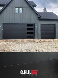 Matte Black Skyline Flush Garage Doors On Contemporary Custom Home Garage Door Styles Modern Garage Doors Custom Garage Doors