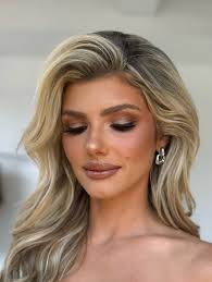 Kiss and Makeup Houston added a...