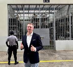West Virginia lawmaker gives the thumbs up while visiting El Salvador  prison housing U.S. deportees