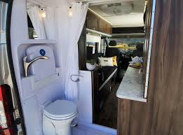 Most outdoor kitchens or galleys include a cooktop and sink along with a bit of counter space for preparation. Compact Camper Van Fits A Bathroom Sleeps Two Curbed