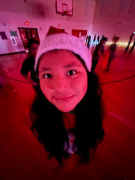 Taylor McLemore came to read to Ms. Wiggins's class and teach them how to  be smart cookies.