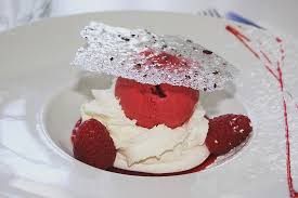 Tuile cookies are often shaped like a pringle potato chip. Meringue Sorbet Framboise Tuile Aux Fleurs D Hibiscus Picture Of Cafe De La Gare 1900 Saint Andre De Cubzac Tripadvisor