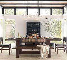 It can be a small table when it's just you and your family eating, but once guests come or if you're laying on a buffet, it instantly becomes a large kitchen table, which is the perfect way to have an entertaining table without it taking up too. Buy Madera Extending Dining Collection Online Pottery Barn Uae