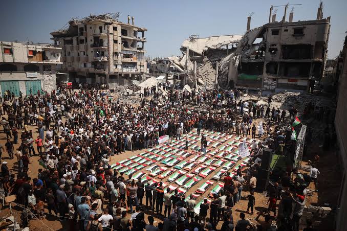 In Gaza, a mass funeral for 112 members of 2 families, three years after  deadly Israeli strike