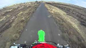 Spectators gathered around to watch the. Alex Harvill Long Distance Dirt Bike Jump May 2012 Youtube