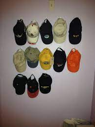 Great Storage Idea For A Hat Collector Hang Hats On Command Hooks Did This In My Daughters Room As Well Hanging Hats Hat Storage To My Daughter