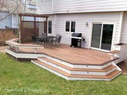 Many people choose cedar wood for decks. 25 Ground Level Deck Ideas And Designs