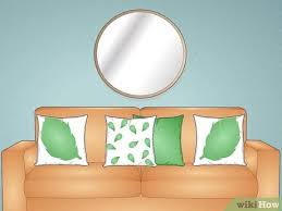 Pebbles add texture and contrast in the interior. 10 Simple Ways To Decorate Around A Round Mirror Wikihow
