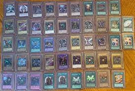 I M Selling My Yugioh Cards Collection All Holographic Lob Mrl Psy Sdy And More Plus All The Spell Cards Are Original Magic Ca Yugioh Cards Yugioh Cards