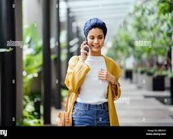 Gambar young woman wearing a turban hijab