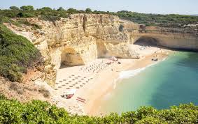 Praia da Marinha - Fotos, história, revisão, hotéis
