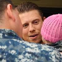 Marine 1st Lt. James D. Lasley spends time with a baby