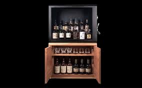 A wide variety of whiskey bottles display. Whisky Vault A Modern Cabinet To Keep Safe Your Whiskey Bottles
