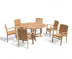 Make the most of the sunnier days with our beautiful range of garden furniture. Berrington 6 Seater Round Folding Garden Table 1 5m And Bali Teak Stacking Chairs