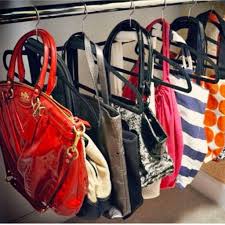Chances are, some of the old purses you've got stacking up in your closet have little stains, spills, rips, tears, and more going on. Small House Storage Hacks How To Organize A Small House With No Storage Space Purse Storage Organizing Purses In Closet Purse Organization