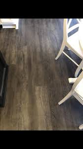 Trafficmaster is water resistant and can be installed almost anywhere walnut texture wood grain texture 3d texture dark wood floors wood paneling wood flooring woodworking finishes walnut wood dark walnut. Life Proof Dark Oak Luxury Vinyl Wide Plank Flooring From The Home Depot Flooring Best Flooring Dark Vinyl Plank Flooring