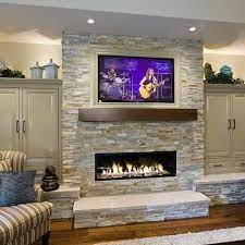 20 Amazing Fireplaces With Tv Above Fireplace Tv Ideas Decoholic Stone Fireplace Designs Home Fireplace Fireplace Design