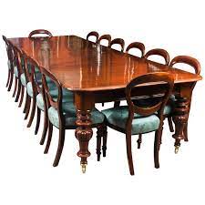 Antique inlaid bellflower mahogany georgian hepplewhite needlepoint accent chair. 19th Century Victorian Flame Mahogany Dining Table And 14 Antique Chairs Mahogany Dining Table Dining Table Oval Table Dining