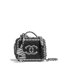 Authentic Black And White Chanel Bag Discover The Chanel Grained Calfskin Silver Tone Metal Black White Small Vanity Case And Explore The Artistr Chanel Handbags Chanel Bag Chanel Vanity Case