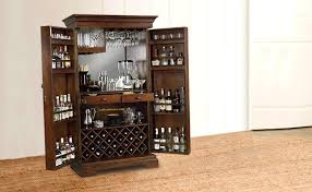 This bar has several cabinets as well. Friday Furniture Solid Sheesham Wood Wine Cabinets Free Standing Wine Rack For Home Storage Rack Wine Glass Bottle Holder Liquor Bar Cabinet Honey Finish Amazon In Home Kitchen